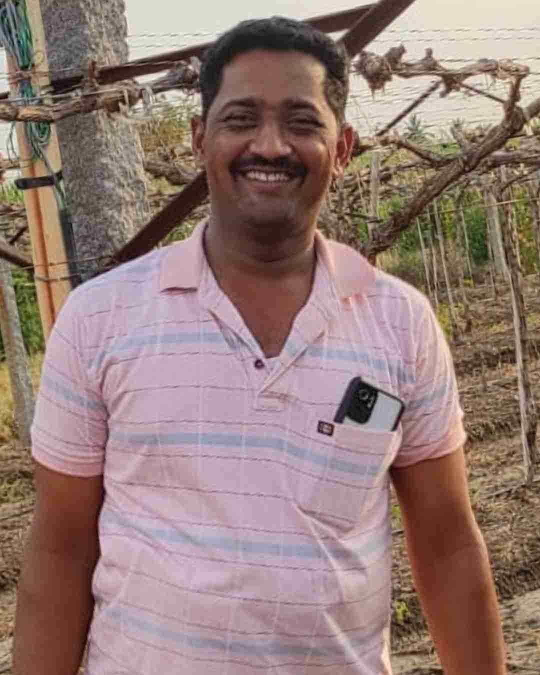 Portrait of Fyllo customer farmer showing crop yield success